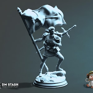 May include: A detailed 3D-printed figurine of a knight holding a flag and a sword. The knight is clad in armour and stands on a rocky base. The flag is billowing, and the sword is held over the shoulder. The base is round and the figurine is in a monochrome colour.