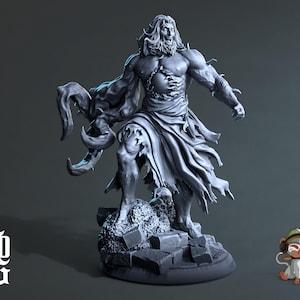May include: A gray, detailed miniature figurine of a muscular, bearded man with a tattered cloak and a monstrous appendage. The figure is standing on a rocky base.