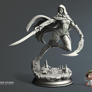 May include: A detailed, grey figurine of a hooded warrior in a dynamic pose, wielding two curved blades. The figure is leaping from a rocky base, with intricate armour and flowing cape details. The base has a circular design.