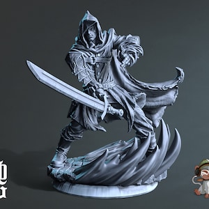 May include: A detailed figurine of a hooded warrior holding a large sword, poised in a dynamic stance. The figure is clad in ornate armour and a flowing cape, standing on a stylized base with flame-like accents. The figurine is a light grey colour.
