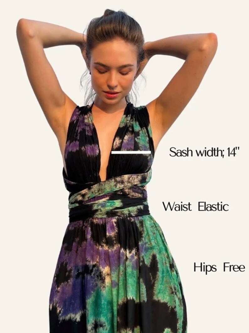 Infinity Tie Dye Mini Dress by COCO DE CHOM® – handmade bohemian summer dress with open back halter neckline, side pockets, and elastic waist. Lightweight resort wear perfect for beach vacations, festivals, honeymoons, or pool parties. Ethically made from 100% soft rayon with a one-of-a-kind hand-dyed pattern. Flowy, breathable, and designed for S/M/L body types.