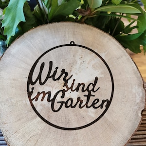 Tree disc with engraving, engraved, decoration, wood, garden