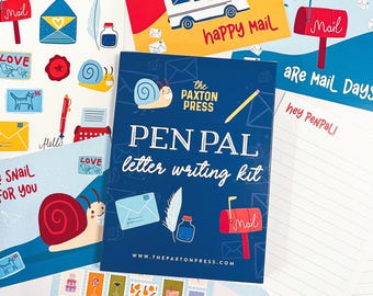 May include: A collection of stationery items with a snail mail theme. Includes a blue "Pen Pal letter writing kit" box, sticker sheets, and cards with mail-related graphics. The text "Snail Mail Stickers" and "Happy Mail" are visible.