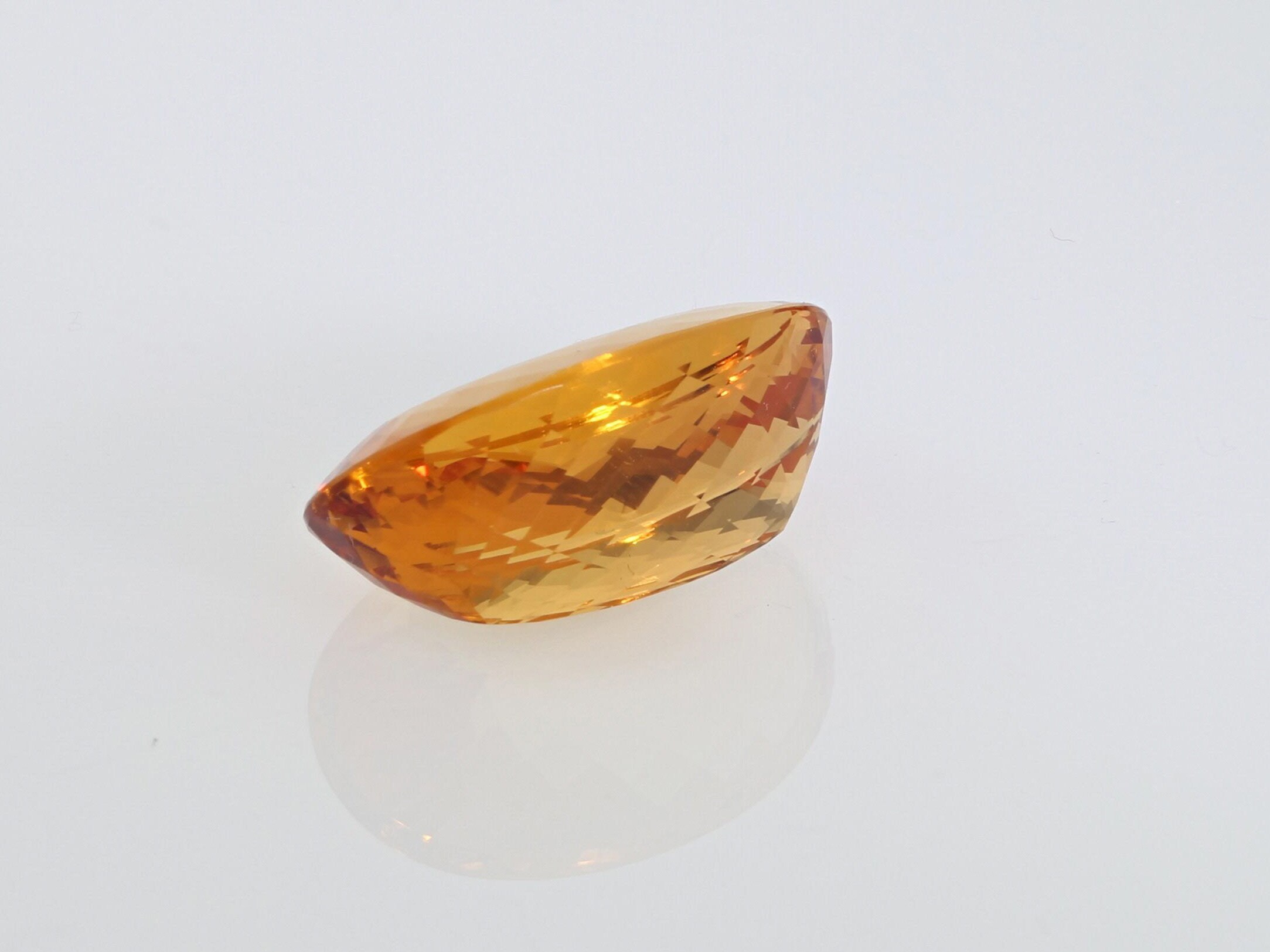 24.36 Cts Imperial Topaz, Oval Shape, Golden Peachy Orange With
