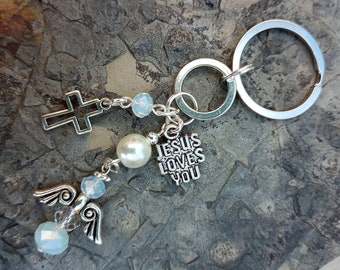 Angel of faith handmade keychain/bag charm. With hand beaded Angel and religious silver charms.