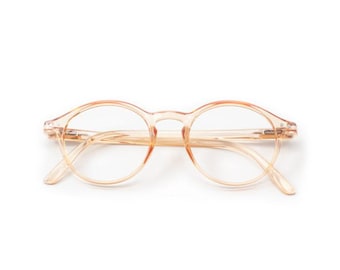 May include: A pair of round, clear, peach-colored eyeglasses.