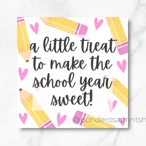 May include: A square card featuring a white background with a pattern of yellow pencils with pink erasers and small pink hearts. The text in the center reads, a little treat to make the school year sweet! The text @ponderosaprintshop is at the bottom.