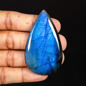 Cabochões em formato de pêra labradorita azul natural, pedras preciosas de ótima qualidade com parte traseira plana para fazer joias. Muitos tamanhos disponíveis