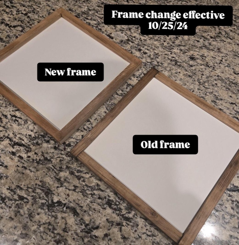 May include: Two square wooden framed signs with white centers. One sign is labeled "New frame" and the other "Old frame." The text "Frame change effective 10/25/24" is at the top. The frames are a light brown color.