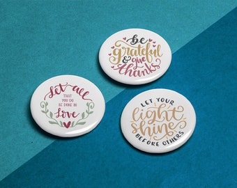 Religious Sayings on 2.25 inch Buttons. Bright, sharp colors with clear graphics make for a great collectable button.