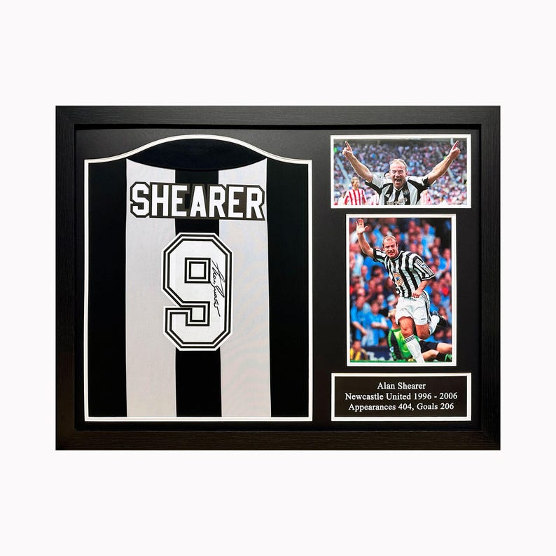 May include: A framed black and white soccer jersey with the name "Shearer" and the number "9" on the front. The jersey is signed by Alan Shearer. The frame includes two photos of Shearer playing soccer.
