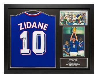 Camiseta de Francia firmada por Zinedine Zidane, enmarcada, con certificado de autenticidad y prueba fotográfica.