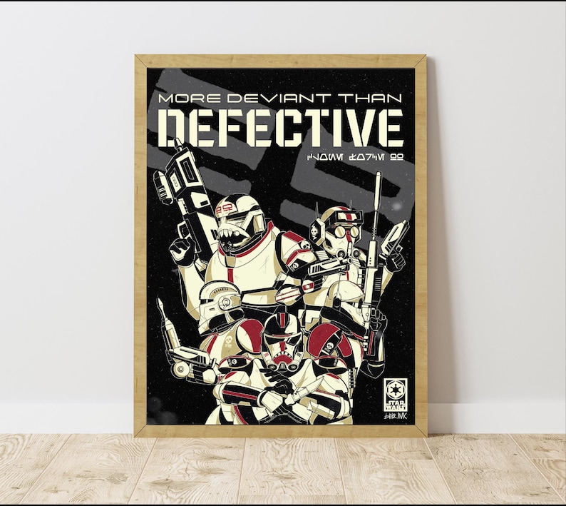 May include: Framed poster depicting Star Wars clone troopers in white and red armour, holding weapons. The poster has the text "MORE DEVIANT THAN DEFECTIVE" in bold, white letters against a black background.
