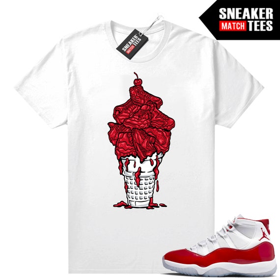 Cream and red jordan 11 2025