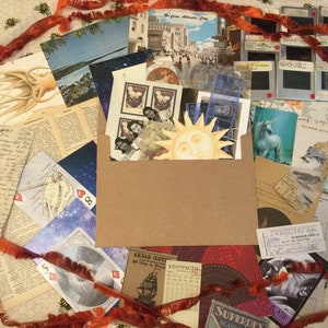 Junk journal mystery envelope surprise scrapbook ephemera papers crafting snail mail vintage fabric swatch photographs postcards stamp