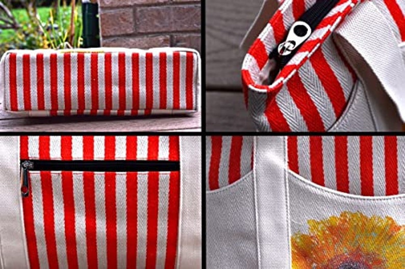 May include: A white canvas tote bag with red and white stripes. The bag has a zippered pocket on the front and a sunflower design on the bottom.