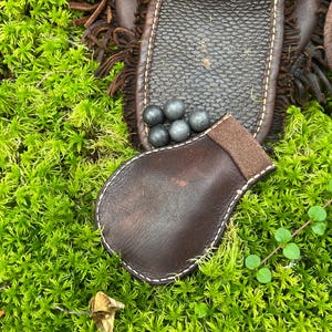 Leather ball bag, handstiched with linen