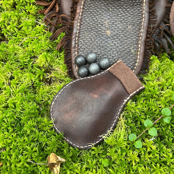 Leather ball bag, handstiched with linen