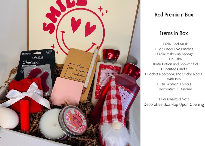 May include: A red premium gift box filled with self-care items. Includes a facial peel mask, under eye patches, lip balm, body lotion, a scented candle, a notebook, socks, and a decorative gnome. The box has a smiley face design.