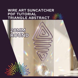 May include: A wire art suncatcher with a triangle abstract design. The suncatcher is made of purple wire and features a 20mm round crystal ball at the bottom. The text "WIRE ART SUNCATCHER PDF TUTORIAL TRIANGLE ABSTRACT" is at the top.