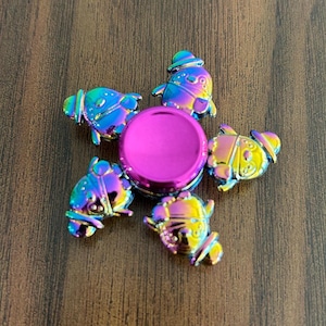 Penguin Waddle Fidget Spinner: Iridescent Rainbow Metal Focus Toy