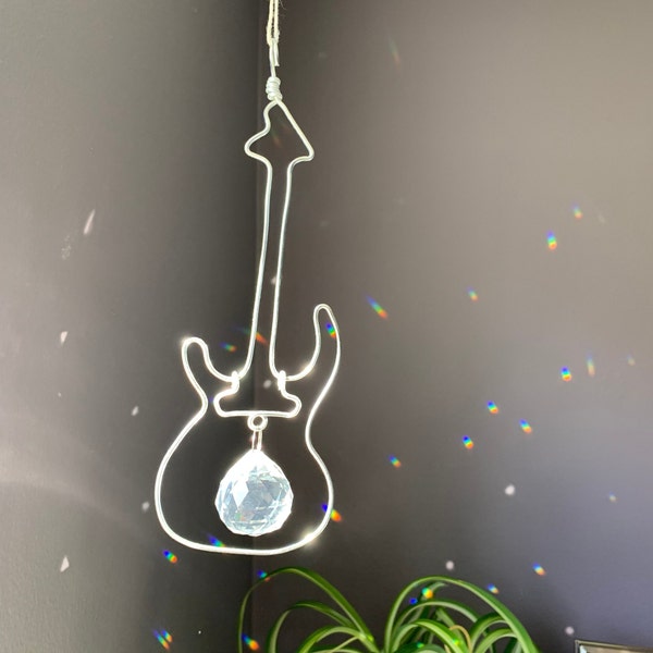 Rockin' electric guitar minimalist wire jewelry features high clarity clear glass rainbow maker crystal prism orb soothing window decoration