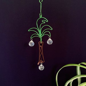 Minimalist wire art palm tree prism pendant is handmade and features guaranteed rainbows when placed in direct sunlight use in home & office