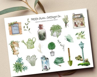 May include: A sticker sheet with a green garden theme. The sheet includes images of a house, a watering can, a potted plant, a butterfly, a garden gnome, a pair of gardening gloves, a lantern, a hose, a shovel, and a succulent. The sheet is titled "Petite Green Cottage Co. Green Garden Sticker Sheet."