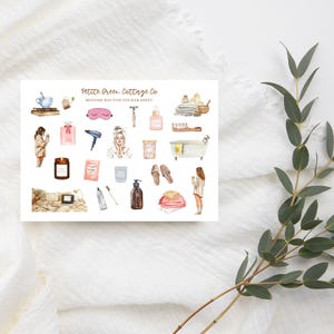 May include: A sticker sheet with watercolor illustrations of bedtime routine items. Includes a pink sleep mask, a hair dryer, a bathtub, a candle, and a woman in a robe. The text "Petite Green Cottage Co" is at the top.