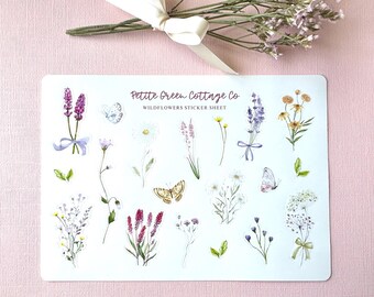 May include: A sticker sheet with a white background featuring watercolor illustrations of wildflowers, butterflies, and sprigs of lavender. The sheet is titled "Petite Green Cottage Co. Wildflowers Sticker Sheet".