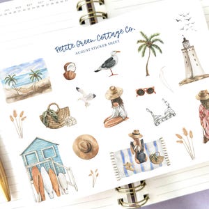 May include: A sticker sheet with watercolor illustrations of a beach theme. The sheet includes images of a beach scene, palm trees, a lighthouse, seagulls, sunglasses, a bikini, a beach hut, surfboards, and people in beach attire. The text "Petite Green Cottage Co. August Sticker Sheet" is at the top.