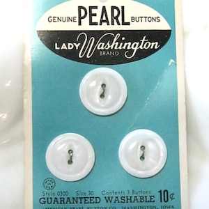 May include: Vintage card of three white pearl buttons, size 30, from the Lady Washington brand. The card has a teal background with the text "Genuine Pearl Buttons" and "Guaranteed Washable". Made in the USA.