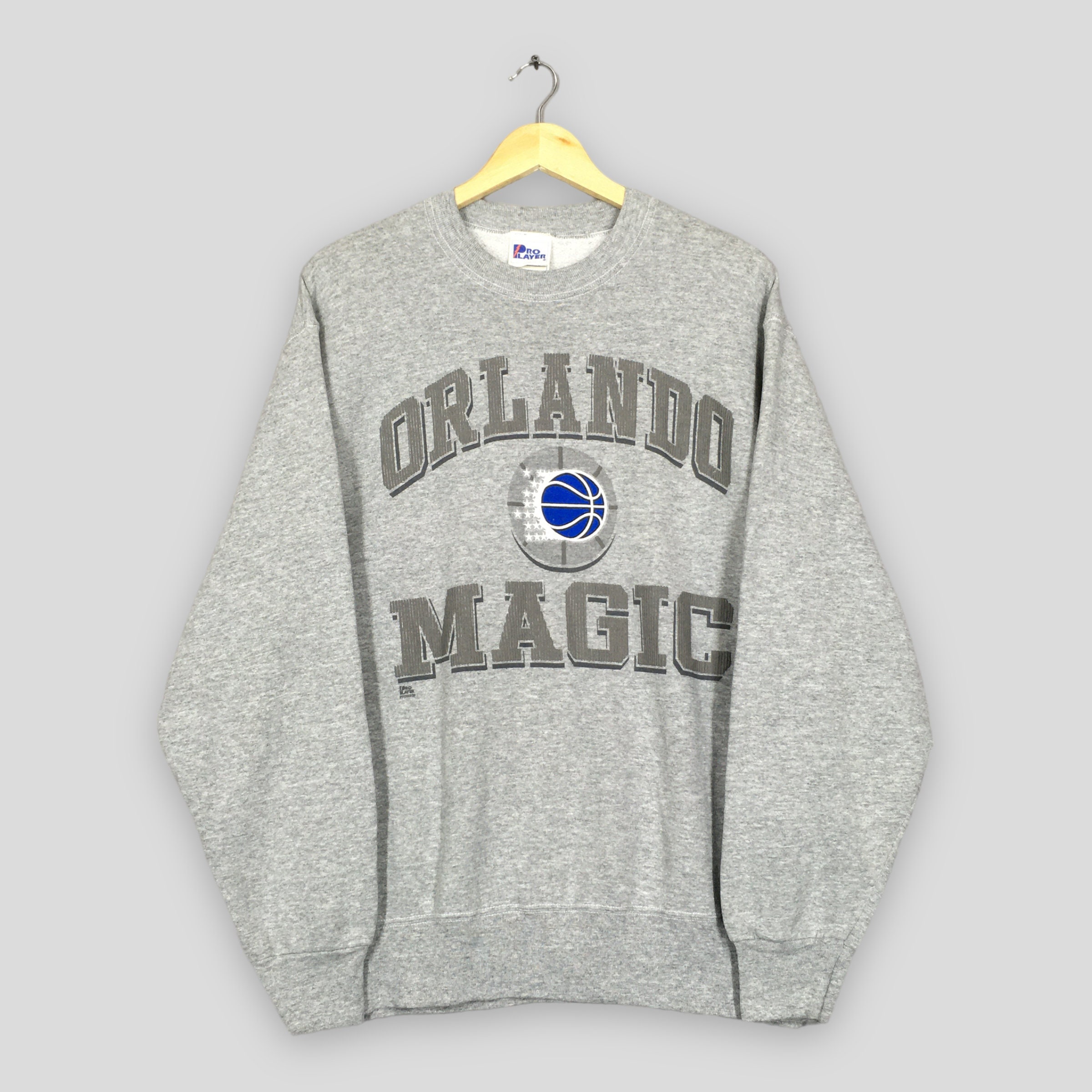 Orlando Magic The Magician T-Shirt from Homage. | Charcoal | Vintage Apparel from Homage.