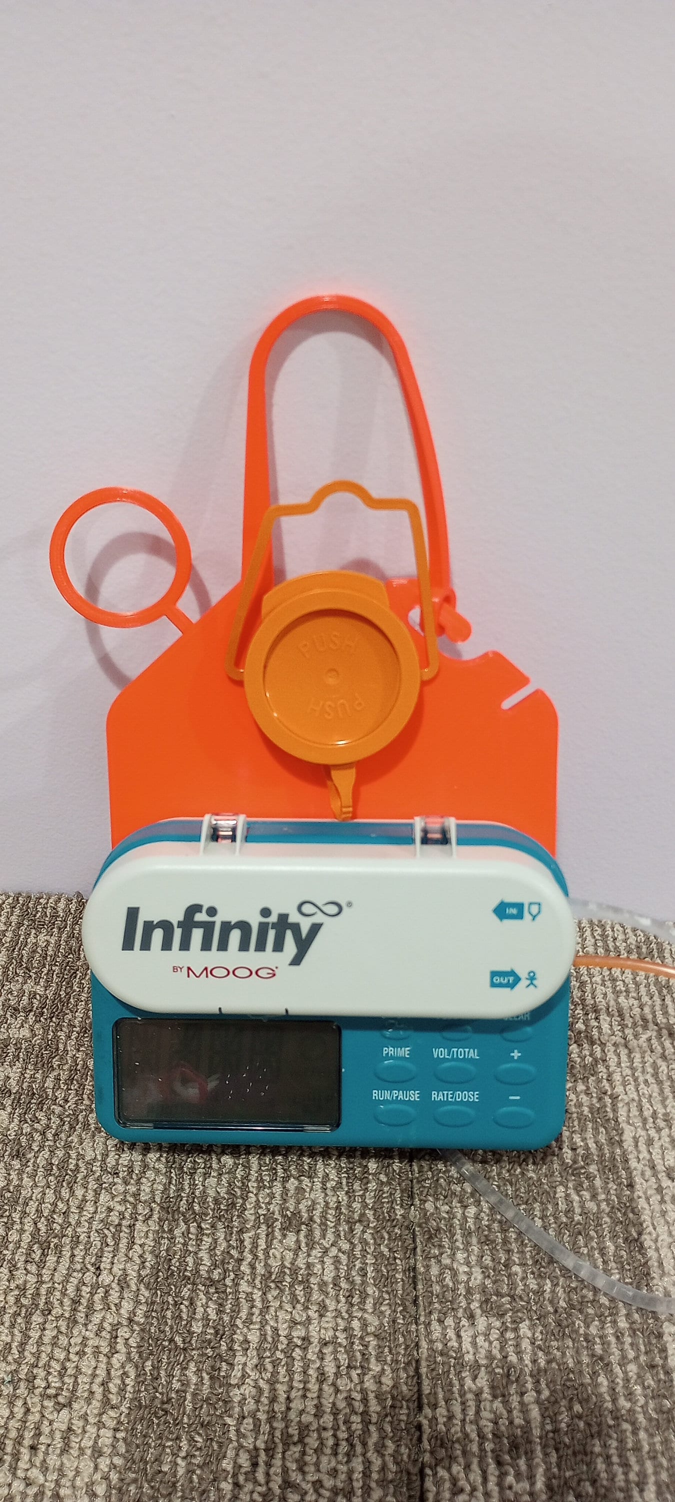 Tubie Hang™ Orange G-tube Feeding Pump Hanger for Infinity Orange