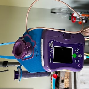 Tubie hang™ Puggle g-tube feeding pump hanger works with Puggle™ Enteral feeding pump