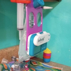 Colgador para bomba de alimentación por sonda Tubie hang™1200 g para bolsa de 1200 ml