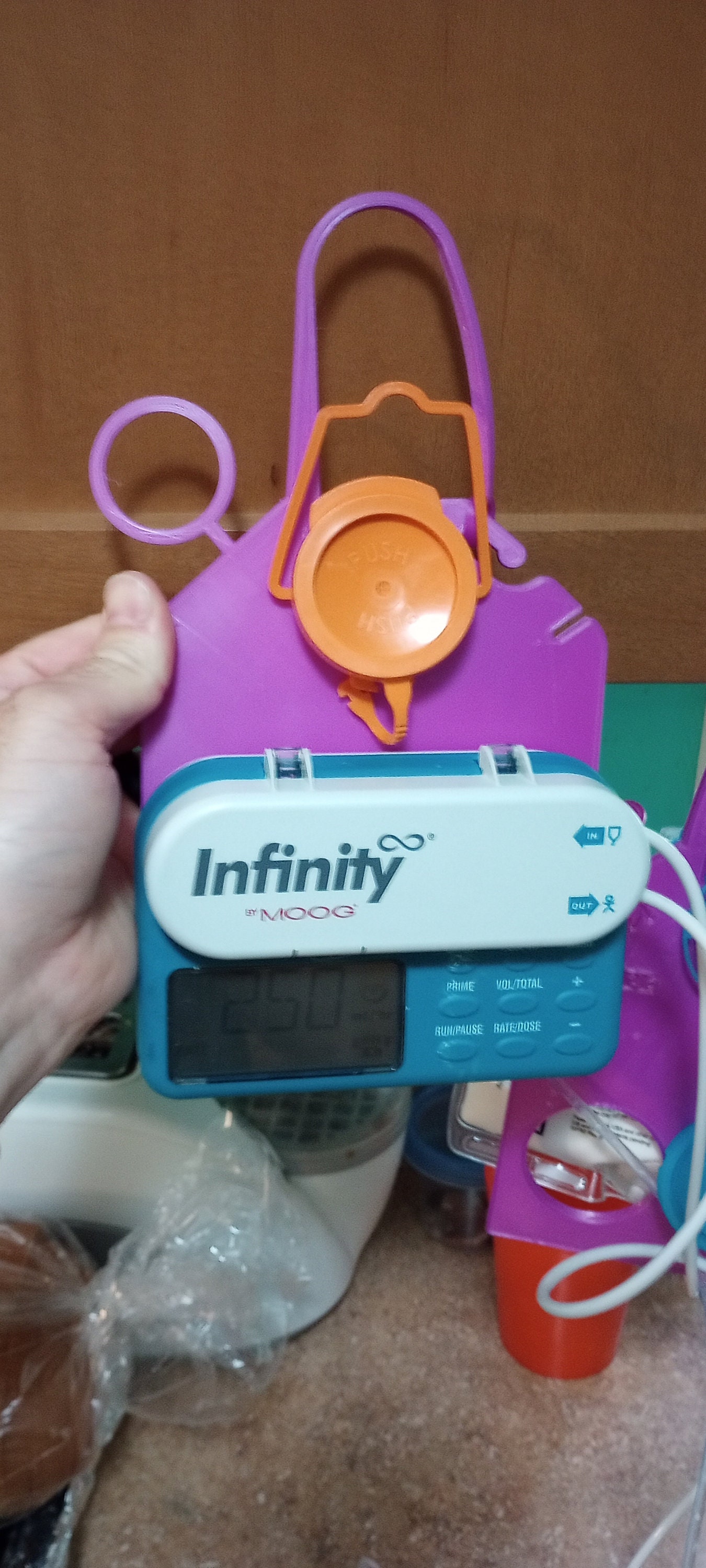 Tubie Hang™ Orange G-tube Feeding Pump Hanger for Infinity 