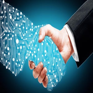 May include: A digital handshake illustration. Two hands clasped in a handshake, one hand is a circuit board design in blue and white. The other hand is a person wearing a black suit jacket. The background is a gradient of blue.