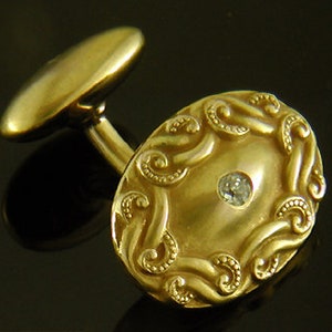 Victorian Diamond Cufflinks with Scrolls created by H.A. Kirby & Co. in 14kt Gold circa 1890