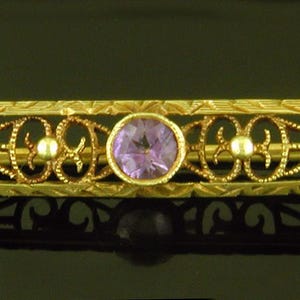 Amethyst and Flowers Brooch created in 14kt Gold circa 1920