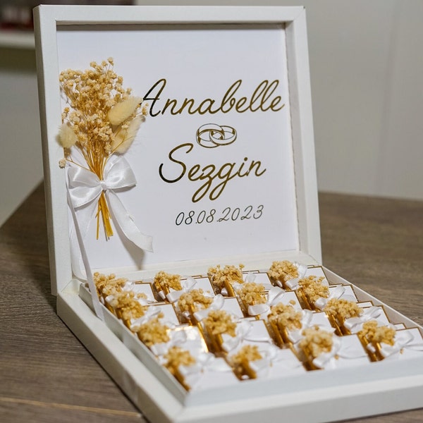 Chocolate box gold foiled and individually decorated with dried flowers in an engagement design