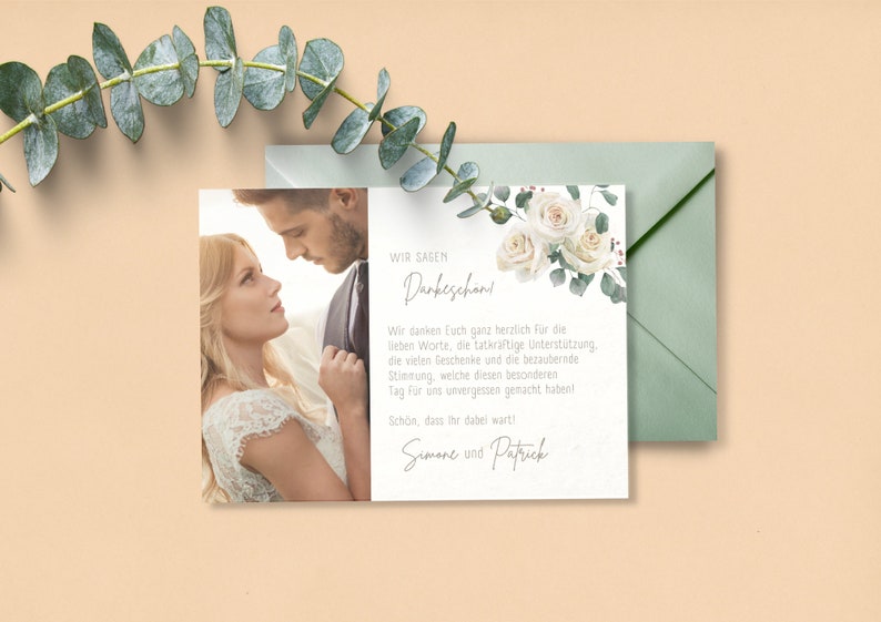 May include: A wedding thank you card with a photo of a couple in front of a white floral design. The text reads "Wir sagen Dankeschon!" and "Wir danken Euch ganz herzlich fur die lieben Worte, die tatkr&auml;ftige Unterst&uuml;tzung, die vielen Geschenke und die bezaubernde Stimmung, welche diesen besonderen Tag f&uuml;r uns unvergessen gemacht haben! Sch&ouml;n, dass Ihr dabei wart! Simone und Patrick."