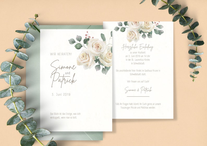 May include: White wedding invitation with a floral design featuring white roses and green leaves. The text reads "Wir Heiraten!" (We are getting married!), "Simone und Patrick" (Simone and Patrick), "5. Juni 2019" (June 5, 2019), and a quote in German. The invitation also includes the date and time of the wedding ceremony and the location.
