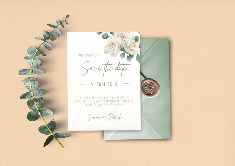 May include: Save the date card with white roses and greenery. The text reads "Wir sagen Ja! Save the date - 3. Juni 2019 - Bitte haltet euch diesen Tag f&uuml;r unsere kirchliche Trauung mit anschlie&szlig;ender Feier frei. Details folgen in der Einladung. Simone und Patrick"