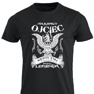 May include: Black t-shirt with a white graphic design featuring an eagle with the text "Najlepszy Ojciec", "Super Tata", "Jedny taki", and "Prawdziwa Legenda".