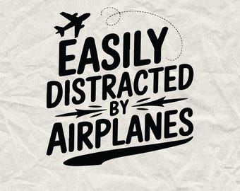 May include: Black and white graphic design with the text "Easily Distracted by Airplanes". The design features a small airplane icon.