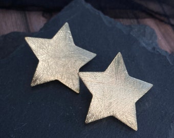 Vintage unbranded clip on gold star earrings