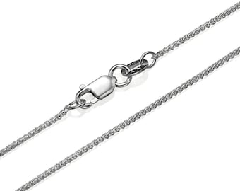 May include: A silver chain necklace with a lobster clasp closure.