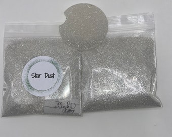 May include: Two bags of silver glitter labeled "Star Dust" and "The Wright Glitter".