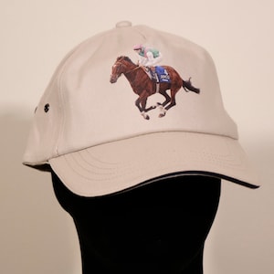 Wonderful Frankel Horse Racing Hat! Stone Coloured Cap with a Painting of Frankel, Printed on the Front. Great Racing hat and Gift Idea!